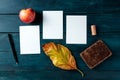 Autumn stationery mockup, three vertical A5 greeting cards or invitations, overhead flat lay shot