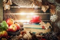 Autumn still life with a cup of coffee, apples and autumn leaves. Autumn background. Royalty Free Stock Photo