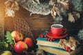 Autumn still life with a cup of coffee, apples and autumn leaves. Autumn background.