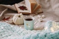 Autumn still life. A cup, dried leaves, book and pumpkin. Hygge lifestyle, cozy autumn mood. Flat lay, thanksgiving background Royalty Free Stock Photo