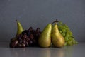 Autumn still life with pears and grapes Royalty Free Stock Photo