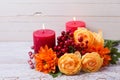 Autumn still life photo with flowers in yellow colors and candl Royalty Free Stock Photo