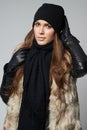 Autumn style. Gorgeous young woman dressed in luxurious winter fashion. Royalty Free Stock Photo