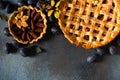 Autumn and summer pie with plum on dark background. Thanksgiving day table