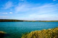 Autumn shore of a large reservoir