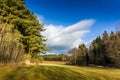 Autumn sunny landscape in windy weather.