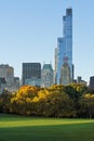 Autumn sunrise in Central Park with view on Midtown Manhattan skyscrapers with One57. New York City