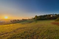 An autumn sunrise in Maastricht overlooking the meadows of the Sint Pieter hill with an historical farm Hoeve Zonneberg Royalty Free Stock Photo