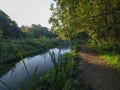 Autumn sunrise on the River Itchen - a famous chalk bed stream renowned for fly fishing - between Ovington and Itchen Abbas in Royalty Free Stock Photo