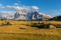 Autumn sunset at Alpe de Suisi with view at Sassolungo in Dolomites in Italy