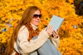 Autumn sunset country - woman read book Royalty Free Stock Photo