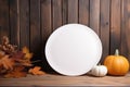 Autumn Table Made Of Wooden Boards With Empty White Plate On Top, Offering Space For Inscriptions Or Logos