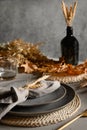 Autumn table setting with dry yellow oak leaves, fall decoration on grey table. Thankisgiving day Royalty Free Stock Photo