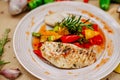 Autumn table setting with pumpkins. Thanksgiving dinner.grilled chicken breast with vegetables Royalty Free Stock Photo