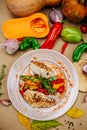 Autumn table setting with pumpkins. Thanksgiving dinner.grilled chicken breast with vegetables Royalty Free Stock Photo