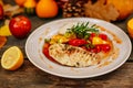 Autumn table setting with pumpkins. Thanksgiving dinner.grilled chicken breast with vegetables Royalty Free Stock Photo