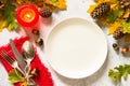 Autumn table setting top view at white table. Royalty Free Stock Photo