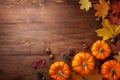 Autumn Thanksgiving background. Pumpkins, acorns and leaves on rustic table top view Royalty Free Stock Photo