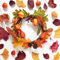 Autumn and thanksgiving background, wreath of leaves and fruits on white, Autumn welcome concept