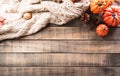 Autumn and thanksgiving decoration concept made from autumn leaves and pumpkin on dark wooden background. Flat lay, top view with Royalty Free Stock Photo