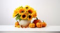 Autumn Thanksgiving decorative arrangement of sunflower flowers and chrysanthemums in pumpkin on white table at home. Thanksgiving