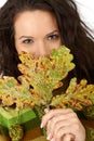 Autumn tree leaf and smiling woman Royalty Free Stock Photo