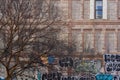 Autumn tree and white brick building with graffiti Royalty Free Stock Photo