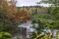 Autumn trees along Dead river in Michigan upper peninsula Royalty Free Stock Photo