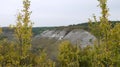 Autumn trees on the background of the chalk mountains