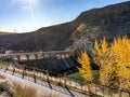 Autumn trees at the Boise Diversion Dam on the Boise River Royalty Free Stock Photo