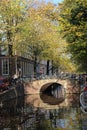Autumn trees and bridge in Amsterdam, Holland Royalty Free Stock Photo