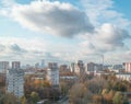 Autumn urban landscape - houses on the outskirts of Moscow at sunset, sky with clouds and residential buildings Royalty Free Stock Photo