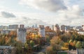 Autumn urban landscape - houses on the outskirts of Moscow at sunset, sky with clouds and residential buildings Royalty Free Stock Photo