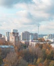 Autumn urban landscape - houses on the outskirts of Moscow at sunset, sky with clouds and residential buildings Royalty Free Stock Photo