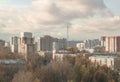 Autumn urban landscape - houses on the outskirts of Moscow at sunset, sky with clouds and residential buildings Royalty Free Stock Photo