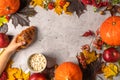 Orange pumpkins and red apples on autumn foliage Royalty Free Stock Photo