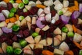 Autumn vegetables sliced and oiled prior to roasting