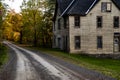 Abandoned Packing House - One Lane Gravel Road in Autumn - New York Royalty Free Stock Photo