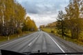 Autumn view of the highway from the cab