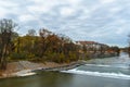 Autumn view with Isar river in Munich, Germany