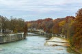 Autumn view with Isar river in Munich, Germany