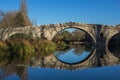 Autumn view of Kadin most - a 15th-century stone arch bridge over the Struma River at Nevestino, Bulgaria Royalty Free Stock Photo