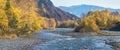 Autumn view of a mountain river. Sunny day. Panorama landscape, Siberia Royalty Free Stock Photo