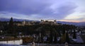 Autumn view of Palace and fortress complex Alhambra with Comares Tower, Palacios Nazaries and Palace of Charles V during sunset in