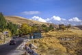 Autumn view on a sunny day on the highway passing through the foothills of the Geghama ridge and