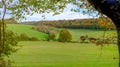 Autumn view towards Uppark Park and the folly known as the Bosom near South Harting Down, South Downs National Park, West Sussex