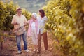 Autumn vineyards. Wine and grapes. Family tradition. family working at winemaker vineyard