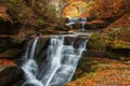 Autumn waterfalls near Sitovo, Plovdiv, Bulgaria. Beautiful cascades of water with fallen yellow leaves.