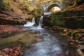 Autumn waterfalls near Sitovo, Plovdiv, Bulgaria. Beautiful cascades of water with fallen yellow leaves. Royalty Free Stock Photo