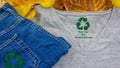 autumn winter jumpers recycle clothes symbol recycle sign, on t shirt and jeans